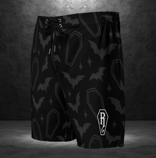 Ryot Ink black board shorts front view with dark alternative tattoo-lifestyle styling