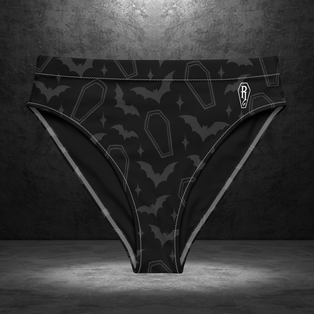 Ryot Ink Coffin and Bat high-waisted bikini bottom side view showing the black and charcoal patterned fit